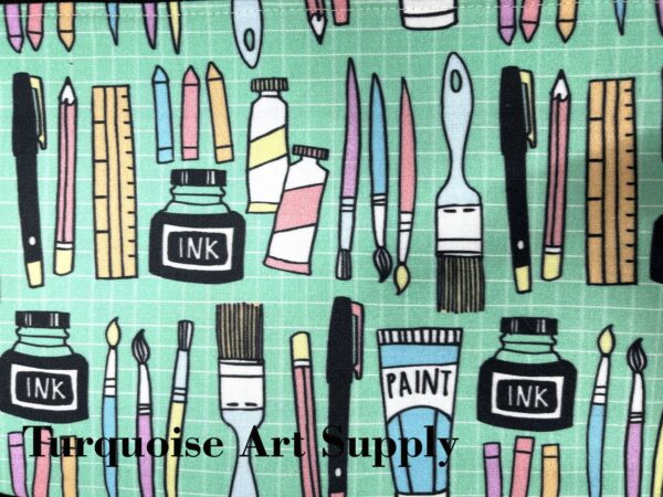 Art supplies on turquoise