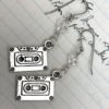 Cassette charm earrings with clear beads