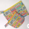 Mixed size zipper pouch in retro cassette fabric