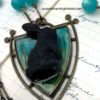 Close-up of rabbit crest necklace