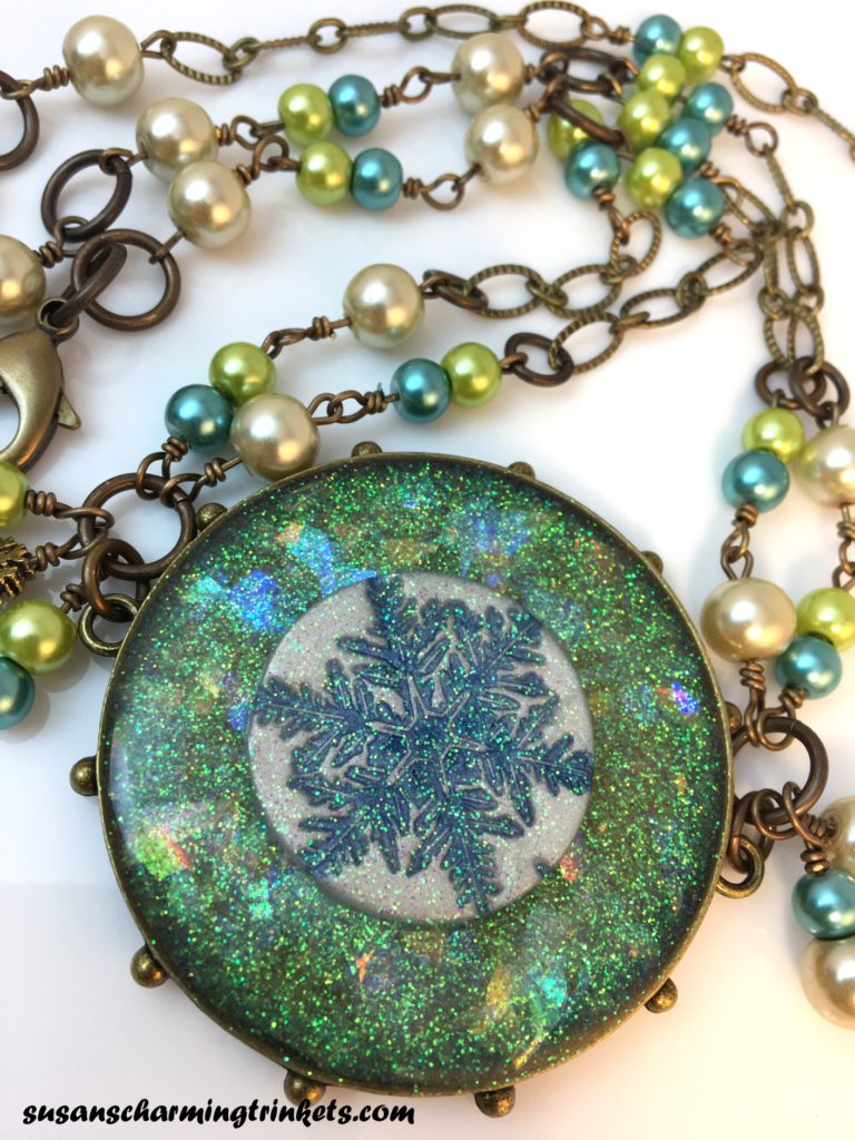 Iridescent Handmade Resin Snowflake in Brass Hobnail Bezel