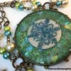 Iridescent Handmade Resin Snowflake in Brass Hobnail Bezel