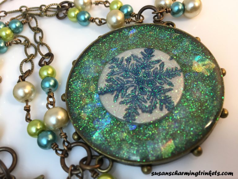 Iridescent Handmade Resin Snowflake in Brass Hobnail Bezel