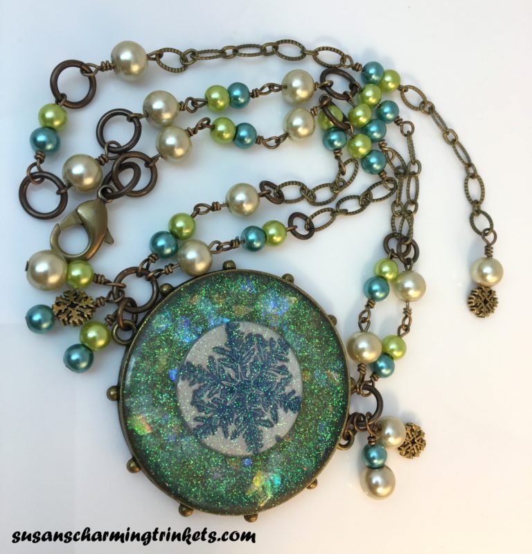 Iridescent Handmade Resin Snowflake in Brass Hobnail Bezel